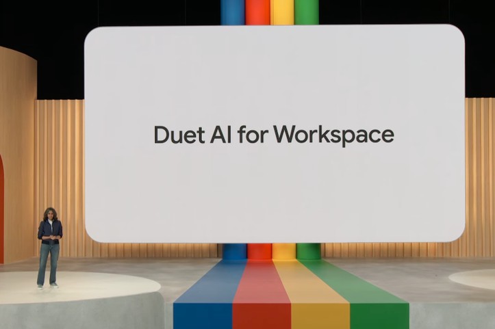 A photograph of a presentation slide saying “Duet AI for Workspace.”